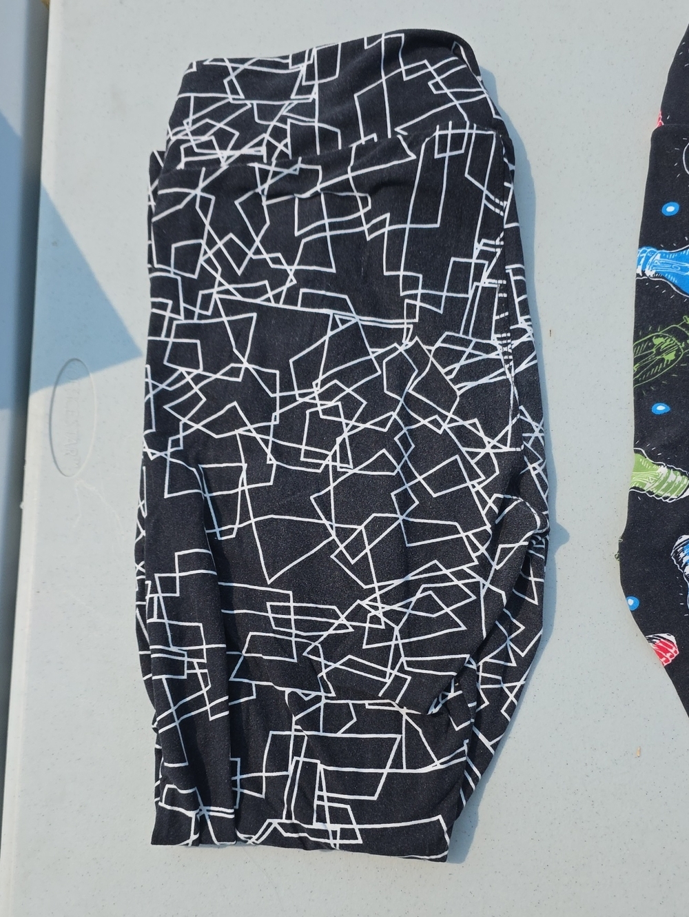 LuLaRoe Black Leggings with White Geometric Print